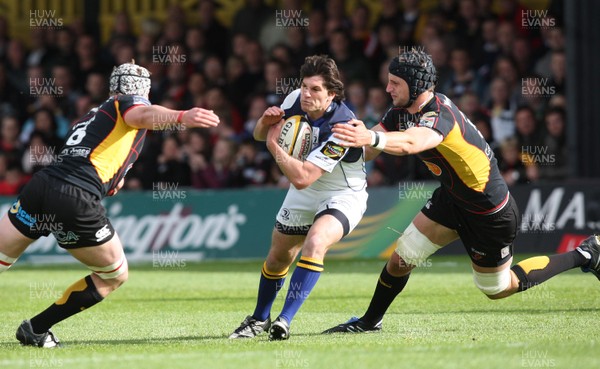 16.05.09 - Newport Gwent Dragons v Leinster, Magners League -  Leinster's Ian McKinley is tackled by Dragons' Dan Lydiate and Luke Charteris  