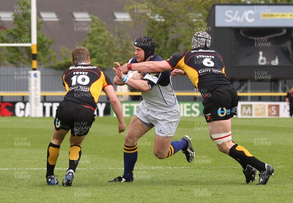 16.05.09 - Newport Gwent Dragons v Leinster, Magners League -  Leinster's Kevin McLaughlin is tackled by Dragons' Dan Lydiate  and Dragons' Jason Tovey  