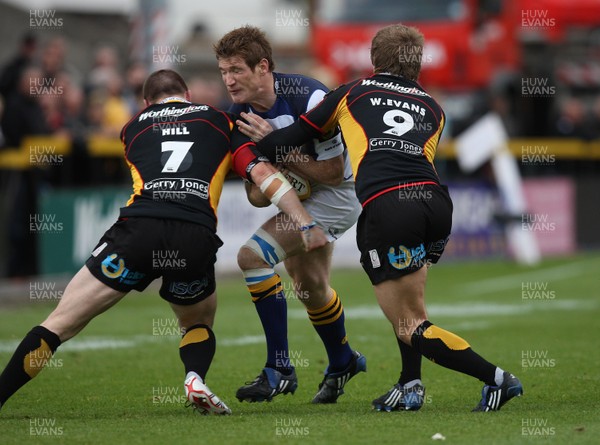 16.05.09 - Newport Gwent Dragons v Leinster, Magners League -  Leinster's Chris Keane is stopped by Dragons' Craig Hill and Wayne Evans   