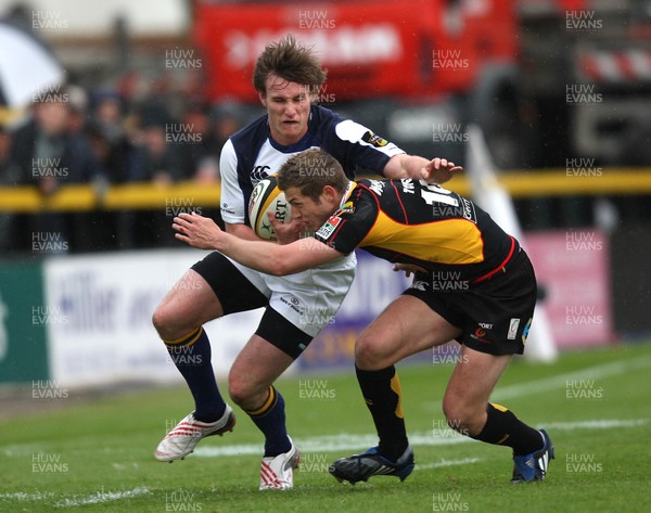 16.05.09 - Newport Gwent Dragons v Leinster, Magners League -  Leinster's Kyle Tonettiis tackled by Dragons' Jason Tovey  