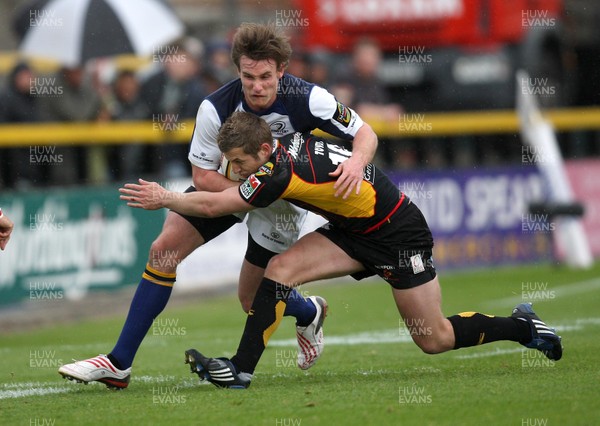 16.05.09 - Newport Gwent Dragons v Leinster, Magners League -  Leinster's Kyle Tonettiis tackled by Dragons' Jason Tovey  