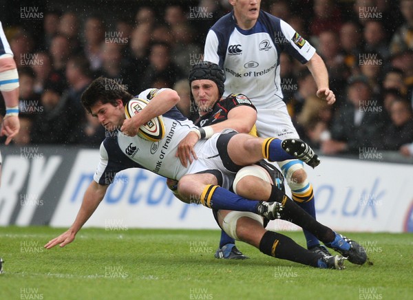 16.05.09 - Newport Gwent Dragons v Leinster, Magners League -  Leinster's Ian McKinley is tackled by Dragons' Luke Charteris   