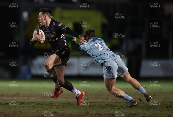 190221 - Dragons v Leinster - Guinness PRO14 - Sam Davies of Dragons is challenged by Rowan Osborne of Leinster