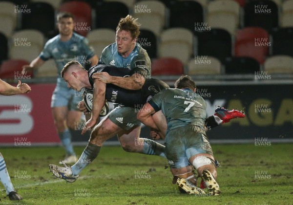 190221 - Dragons v Leinster, Guinness PRO14 - Jack Dixon of Dragons is tackled