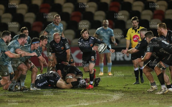 190221 - Dragons v Leinster, Guinness PRO14 - Rhodri Williams of Dragons feeds the ball out
