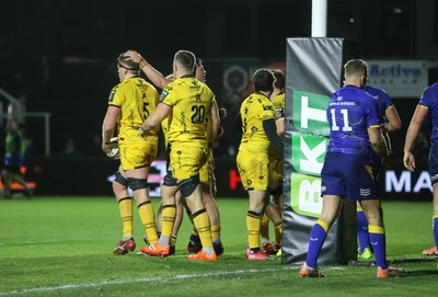 281125 - Dragons RFC v Leinster - United Rugby Championship - Matthew Screech of Dragons celebrates scoring a try with team mates