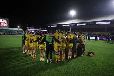 281125 - Dragons RFC v Leinster - United Rugby Championship - Dragons team huddle at full time