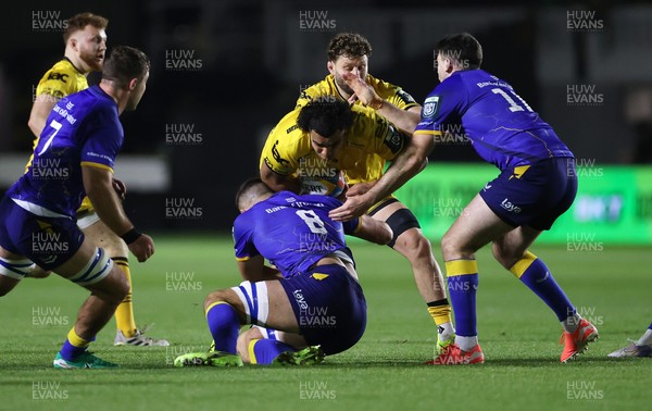 281125 - Dragons RFC v Leinster - United Rugby Championship - Mackenzie Martin of Dragons is tackled by Max Deegan of Leinster 