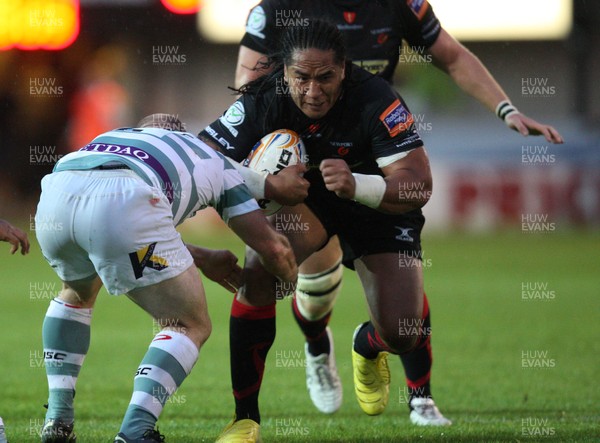 170812 - Newport Gwent Dragons v London Irish, Pre-season Friendly - Dragons Andy Tuilagi drives into London Irish's Scott Lawson