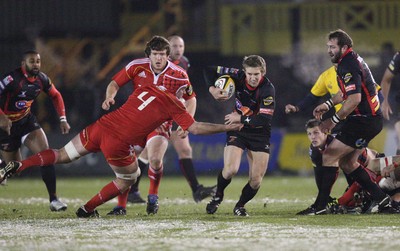 26.11.10...Newport Gwent Dragons v Munster, Magners League -  Dragons' Wayne Evans takes on Munster's Billy Holland    