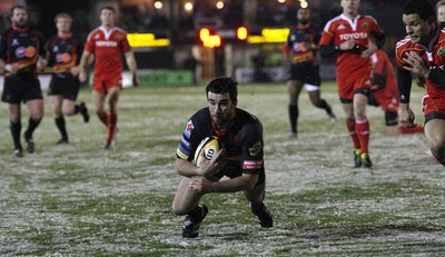 26.11.10...Newport Gwent Dragons v Munster, Magners League -  Dragons' Tom Riley dives in to score try 