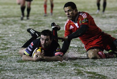 26.11.10...Newport Gwent Dragons v Munster, Magners League -  Dragons' Tom Riley dives in to score try 