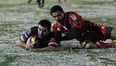 26.11.10...Newport Gwent Dragons v Munster, Magners League -  Dragons' Tom Riley dives in to score try 