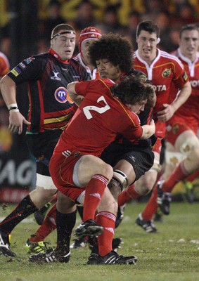 26.11.10...Newport Gwent Dragons v Munster, Magners League -  Dragons' Toby Faletau takes on Munster's Mike Sherry  