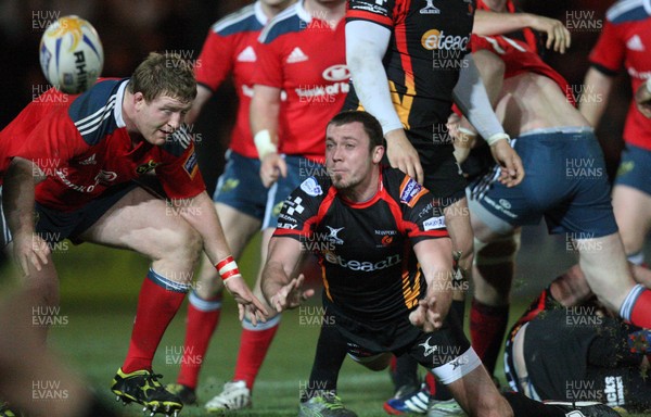 291113 - Newport Gwent Dragons v Munster, RaboDirect PRO12 - Dragons Richie Rees feeds the ball out