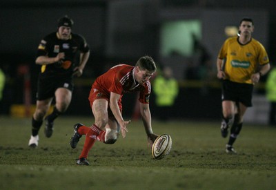 06.02.10 Dragons v Munster... Munster's Ronan O'Gara attempts to recover after fumbling the ball. 