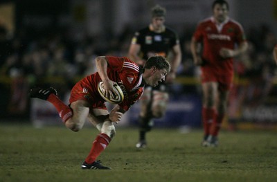 06.02.10 Dragons v Munster... Munster's Ronan O'Gara attempts to recover after fumbling the ball. 