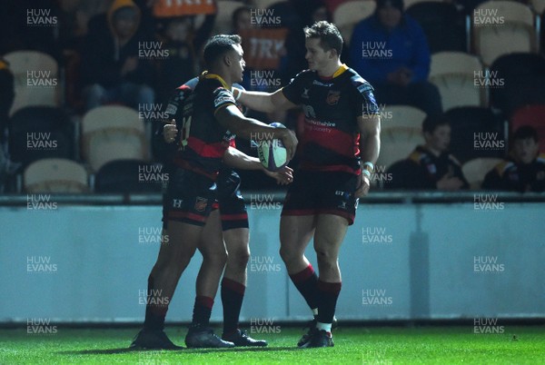 151217 - Dragons v Newcastle Falcons - European Rugby Challenge Cup - Ashton Hewitt of Dragons celebrates his try with Hallam Amos