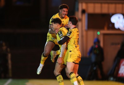 160126 - Dragons v Newcastle Red Bulls - European Rugby Challenge Cup - Rio Dyer of Dragons celebrates scoring a try with team mates