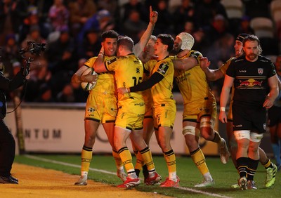 160126 - Dragons v Newcastle Red Bulls - European Rugby Challenge Cup - Rio Dyer of Dragons celebrates scoring a try with team mates