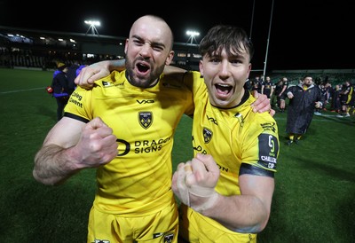 160126 - Dragons v Newcastle Red Bulls - European Rugby Challenge Cup - Cai Evans and Harri Ackerman of Dragons celebrate at full time