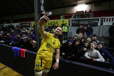 160126 - Dragons v Newcastle Red Bulls - European Rugby Challenge Cup - Harri Keddie of Dragons with fans at full time