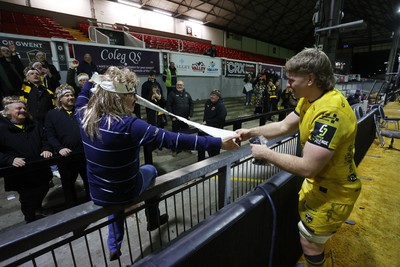 160126 - Dragons v Newcastle Red Bulls - European Rugby Challenge Cup - Aaron Wainwright of Dragons with his group of super fans at full time