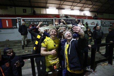 160126 - Dragons v Newcastle Red Bulls - European Rugby Challenge Cup - Aaron Wainwright of Dragons with his group of super fans at full time