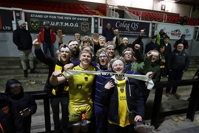 160126 - Dragons v Newcastle Red Bulls - European Rugby Challenge Cup - Aaron Wainwright of Dragons with his group of super fans at full time