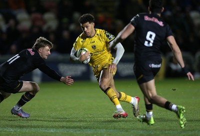 160126 - Dragons v Newcastle Red Bulls - European Rugby Challenge Cup - Rio Dyer of Dragons is challenged by Simon Benitez Cruz of Newcastle 