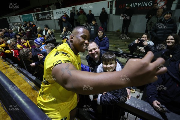 160126 - Dragons v Newcastle Red Bulls - European Rugby Challenge Cup - Cebo Dlamini of Dragons with fans at full time