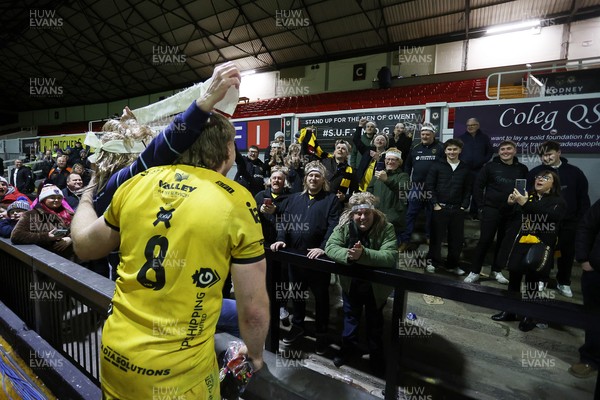 160126 - Dragons v Newcastle Red Bulls - European Rugby Challenge Cup - Aaron Wainwright of Dragons with his group of super fans at full time
