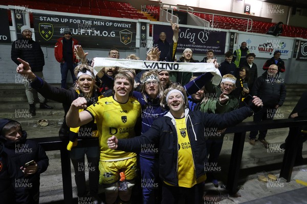 160126 - Dragons v Newcastle Red Bulls - European Rugby Challenge Cup - Aaron Wainwright of Dragons with his group of super fans at full time