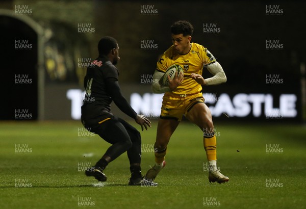 160126 - Dragons v Newcastle Red Bulls - European Rugby Challenge Cup - Rio Dyer of Dragons is tackled by Christian Wade of Newcastle 