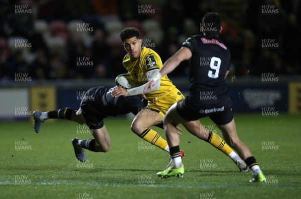 160126 - Dragons v Newcastle Red Bulls - European Rugby Challenge Cup - Rio Dyer of Dragons is challenged by Simon Benitez Cruz of Newcastle 