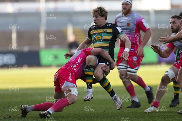 030421 Dragons v Northampton Saints, European Challenge Cup - Harry Mallinder of Northampton Saints is tackled by Aaron Wainwright of Dragons