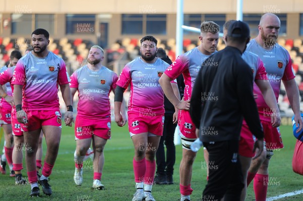 030421 Dragons v Northampton Saints, European Challenge Cup - Dragons players show the disappointment as they leave the pitch after losing to Northampton Saints