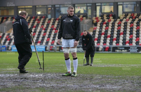 010117 - Newport Gwent Dragons v Ospreys - GuinnessPro12 -  James King of Ospreys takes a  look at the pitch by Huw Evans Agency