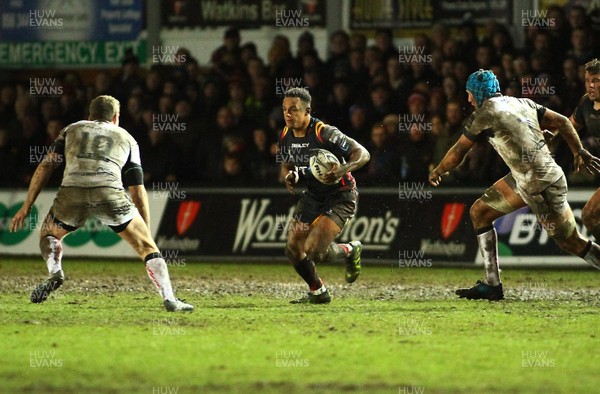 010117 - Newport Gwent Dragons v Ospreys - GuinnessPro12 -  Ashton Hewitt of Dragons takes on Dan Biggar(10) and Justin Tipuric of Ospreys by Huw Evans Agency