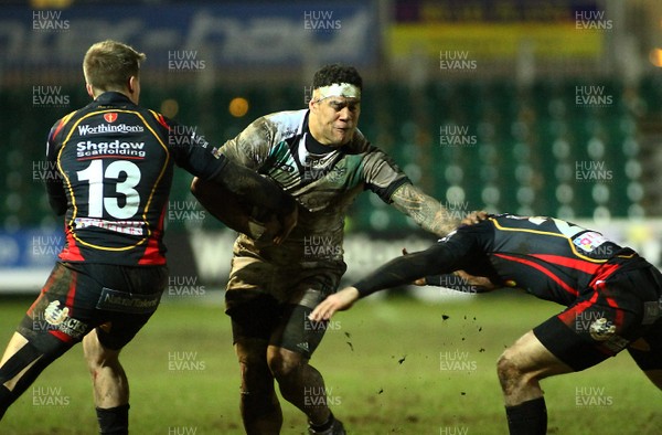 010117 - Newport Gwent Dragons v Ospreys - GuinnessPro12 -  Josh Matevesi of Ospreysis tackled Tyler Morhan(13) and Adam Warren of Dragons by Huw Evans Agency