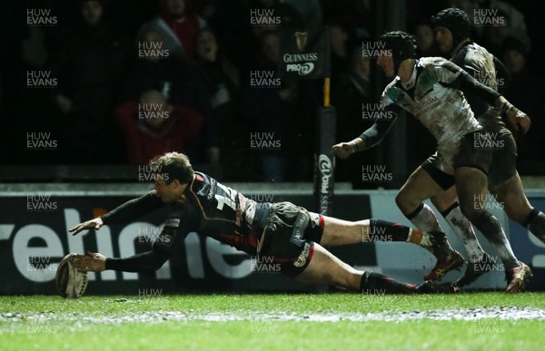 010117 - Newport Gwent Dragons v Ospreys, Guinness PRO12 -Pat Howard of Newport Gwent Dragons reach out in vain as he looks to score by Gareth Everett