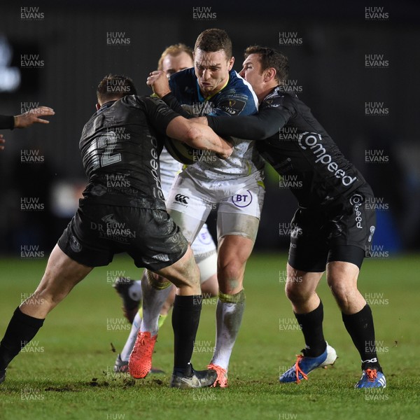 040120 - Dragons v Ospreys - Guinness Pro 14 - George North of Ospreys is tackled by Tom Griffiths of Dragons and Adam Warren of Dragons