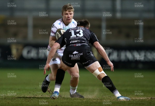 090121 - Dragons v Ospreys - Guinness PRO14 - Keiran Williams of Ospreys is tackled by Nick Tompkins of Dragons