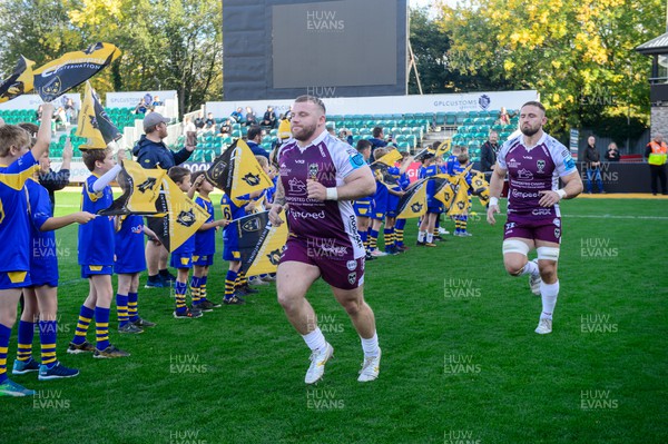 231022 - Dragons RFC v Ospreys - United Rugby Championship - Lloyd Fairbrother and Harrison Keddie of Dragons lead their team out as they make their 150th and 100th appearances