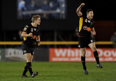 27.03.10 - Newport-Gwent Dragons v Ospreys - Magners League - Wayne Evans and Jason Tovey of Newport-Gwent Dragons celebrate win. 