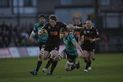 27.03.10 Dragons v Ospreys... Dragons' Hugh Gustafson breaks past Ian Evans 