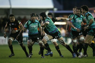 27.03.10 Dragons v Ospreys... Ospreys Ryan Jones looks for space. 