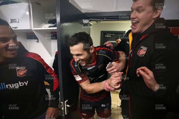 301218 - Dragons v Ospreys - Guinness PRO14 - Jason Tovey of Dragons is pulled into the changing room by Ian Evans