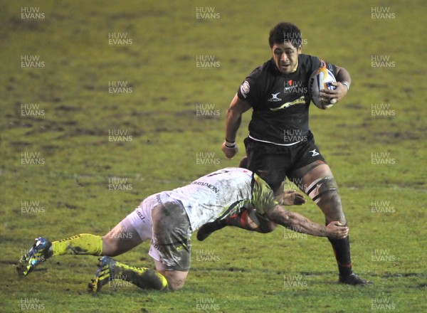 311212 - Newport Gwent Dragons v Ospreys -  RaboDirect PRO12 -   Dragon's Toby Faletau, right, is tackled by Osprey's Sam Lewis   