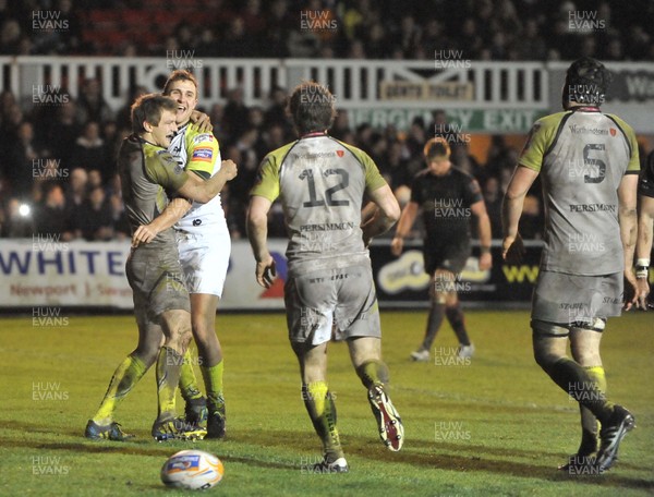 311212 - Newport Gwent Dragons v Ospreys -  RaboDirect PRO12 -   Osprey's Ashley Beck, second left, celebrates with Osprey's Dan Biggar after scoring    